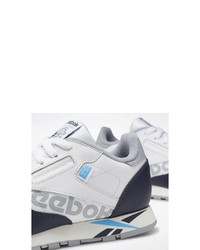 dunkelblaue und weiße hohe Sneakers von Reebok Classic