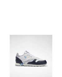 dunkelblaue und weiße hohe Sneakers von Reebok Classic