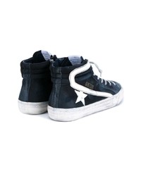 dunkelblaue und weiße hohe Sneakers von Golden Goose Deluxe Brand