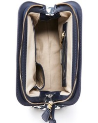 dunkelblaue und weiße Leder Clutch mit geometrischem Muster von Tory Burch