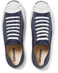 dunkelblaue und weiße niedrige Sneakers von Converse