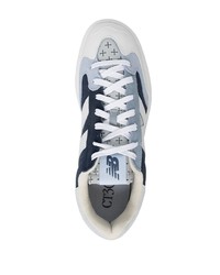 dunkelblaue und weiße Segeltuch niedrige Sneakers von New Balance