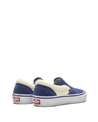 dunkelblaue und weiße Slip-On Sneakers aus Segeltuch von Vans