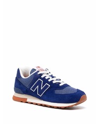 dunkelblaue und weiße Sportschuhe von New Balance