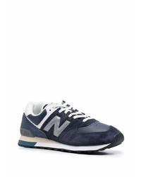 dunkelblaue und weiße Sportschuhe von New Balance