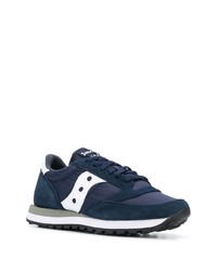 dunkelblaue und weiße Sportschuhe von Saucony