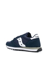 dunkelblaue und weiße Sportschuhe von Saucony