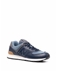 dunkelblaue und weiße Sportschuhe von New Balance