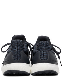 dunkelblaue und weiße Sportschuhe von adidas Originals