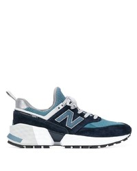 dunkelblaue und weiße Sportschuhe von New Balance