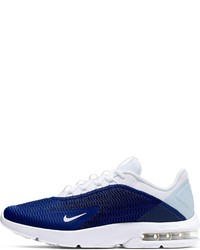 dunkelblaue und weiße Sportschuhe von Nike Sportswear