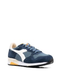 dunkelblaue und weiße Sportschuhe von Diadora