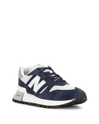 dunkelblaue und weiße Sportschuhe von New Balance