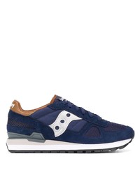 dunkelblaue und weiße Sportschuhe von Saucony