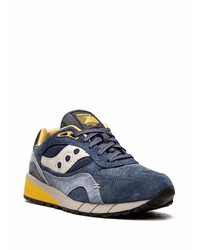 dunkelblaue und weiße Sportschuhe von Saucony