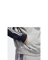 dunkelblauer bedruckter Pullover mit einem Kapuze von adidas Originals