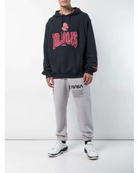 dunkelblauer bedruckter Pullover mit einem Kapuze von Heron Preston