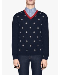 dunkelblauer bestickter Pullover mit einem V-Ausschnitt von Gucci