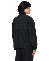 dunkelblauer Fleece-Pullover mit einem Reißverschluss am Kragen von Nike