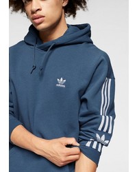 dunkelblauer Pullover mit einem Kapuze von adidas Originals