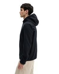dunkelblauer Pullover mit einem Kapuze von Marc O'Polo
