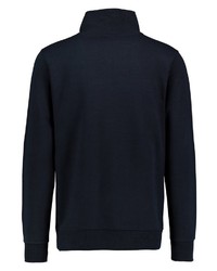 dunkelblauer Pullover mit einem Reißverschluss am Kragen von Stitch & Soul