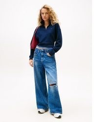 dunkelblauer Pullover mit einem Reißverschluss am Kragen von Tommy Jeans