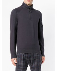 dunkelblauer Pullover mit einem Reißverschluss am Kragen von CP Company