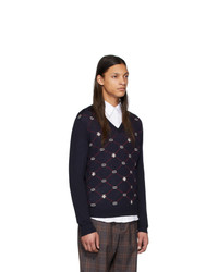 dunkelblauer Pullover mit einem V-Ausschnitt mit Argyle-Muster von Gucci