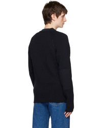 dunkelblauer Pullover mit einem V-Ausschnitt von The Row