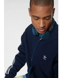 dunkelblauer und weißer Pullover mit einem Rundhalsausschnitt von adidas Originals