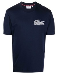 dunkelblaues bedrucktes T-Shirt mit einem Rundhalsausschnitt von Lacoste