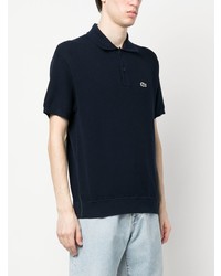 dunkelblaues besticktes Polohemd von Lacoste