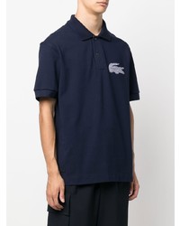 dunkelblaues besticktes Polohemd von Lacoste