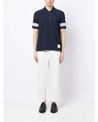 dunkelblaues Polohemd von Thom Browne