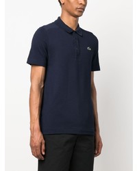 dunkelblaues Polohemd von Lacoste