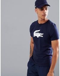 dunkelblaues und weißes bedrucktes T-Shirt mit einem Rundhalsausschnitt von Lacoste Sport