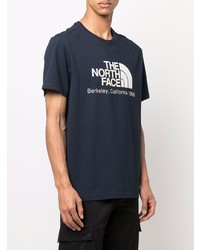 dunkelblaues und weißes bedrucktes T-Shirt mit einem Rundhalsausschnitt von The North Face