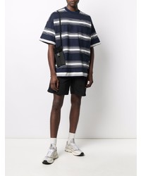 dunkelblaues und weißes horizontal gestreiftes T-Shirt mit einem Rundhalsausschnitt von White Mountaineering