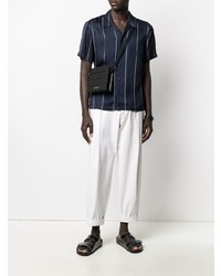 dunkelblaues und weißes vertikal gestreiftes Kurzarmhemd von Sandro Paris