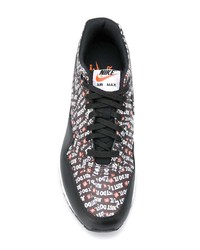dunkelbraune bedruckte Leder niedrige Sneakers von Nike