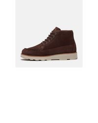 dunkelbraune Chukka-Stiefel aus Wildleder von Timberland