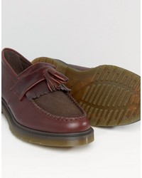 dunkelbraune Slipper mit Quasten von Dr. Martens