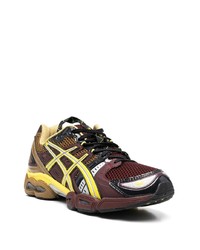 dunkelbraune Sportschuhe von Asics