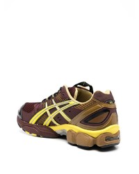 dunkelbraune Sportschuhe von Asics