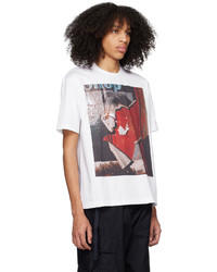 dunkelbraunes bedrucktes T-Shirt mit einem Rundhalsausschnitt von Comme des Garcons Homme