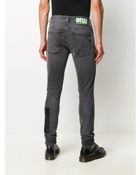 dunkelgraue bedruckte enge Jeans von Diesel