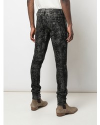 dunkelgraue bedruckte enge Jeans von Amiri