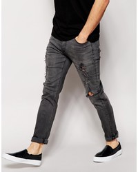 dunkelgraue enge Jeans mit Destroyed-Effekten von Asos