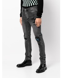 dunkelgraue enge Jeans mit Destroyed-Effekten von Ksubi